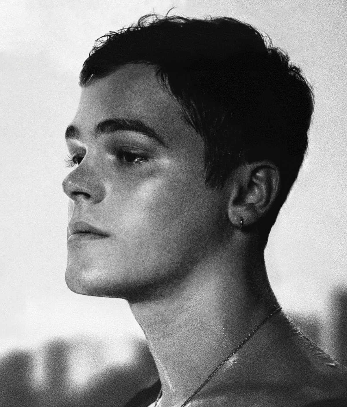 The cover photo of the AFATECS album features a grainy black and white profile portrait of AJ Mitchell.